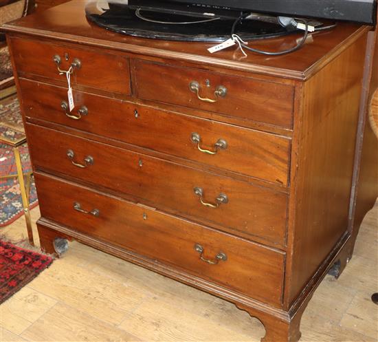 A George III mahogany straight front chest, fitted two short and three long drawers W.106cm